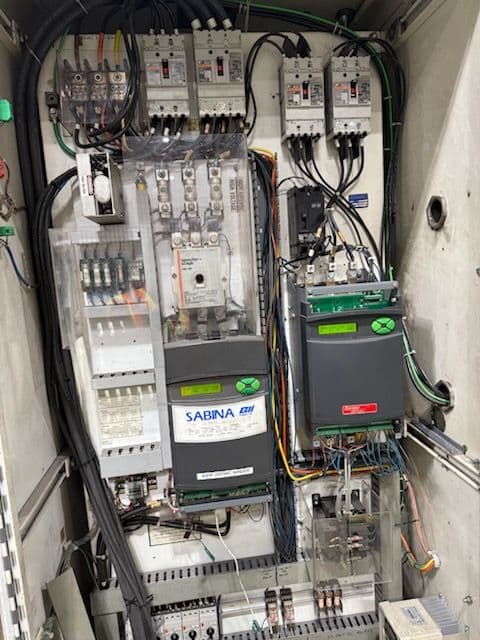 Electrical control panel with circuits, relays, and wiring for industrial applications.